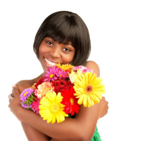 African woman with flowers